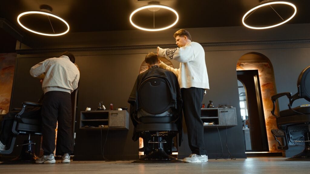 Barber at work during cinematic brand film shoot for Monton Barbers